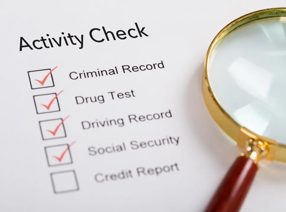 A close up of a paper with a magnifying glass