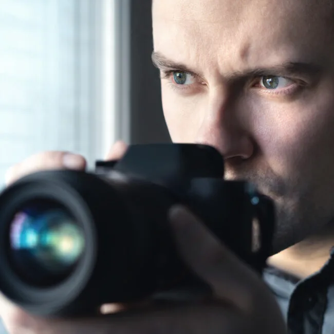 A man taking a picture with his camera.