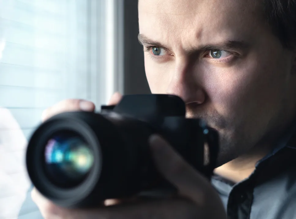 A man taking a picture with his camera.