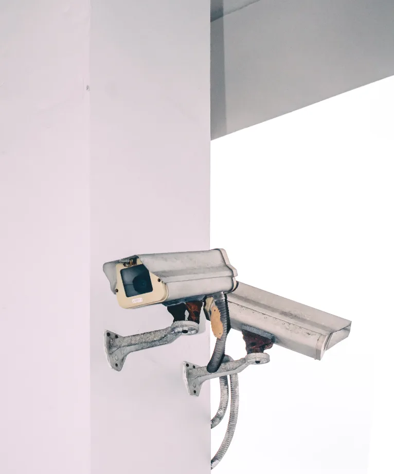 Security camera mounted on wall.